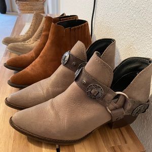 Three pairs of booties 6.5/7 fit.
